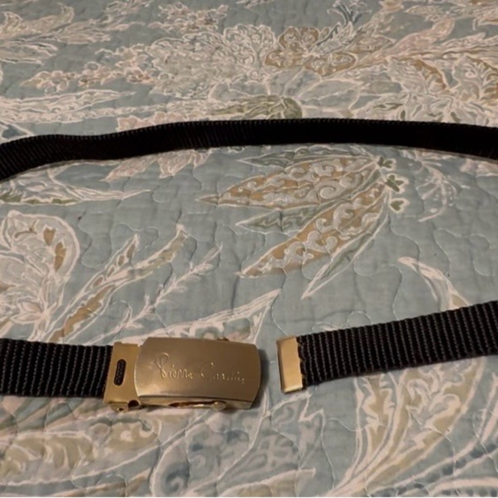Pierre Cardin vintage blk canvas belt with adj buckle, 34”, used/good.
